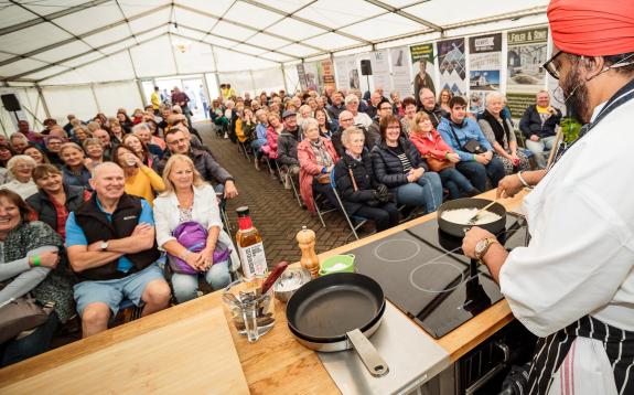 Crowd Watches on to Chef Tony Singh's Cookery Demonstration